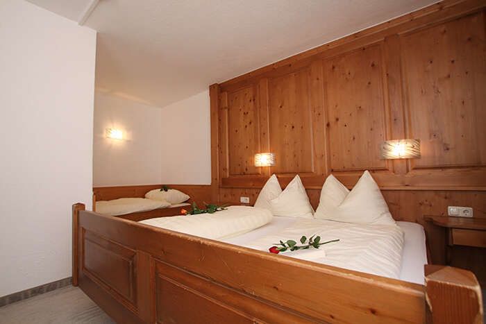 Dreibettzimmer im Appartement 3 in Apart St Hubertus